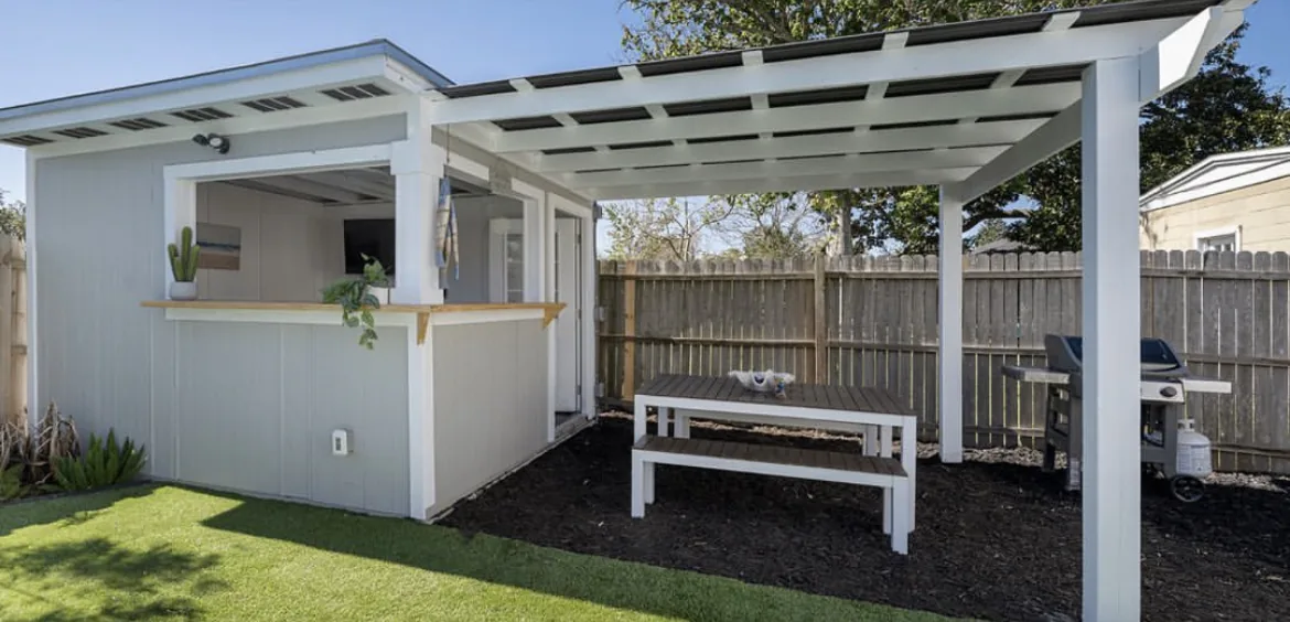 Custom exterior structure and outdoor living area by Cypress Building Group