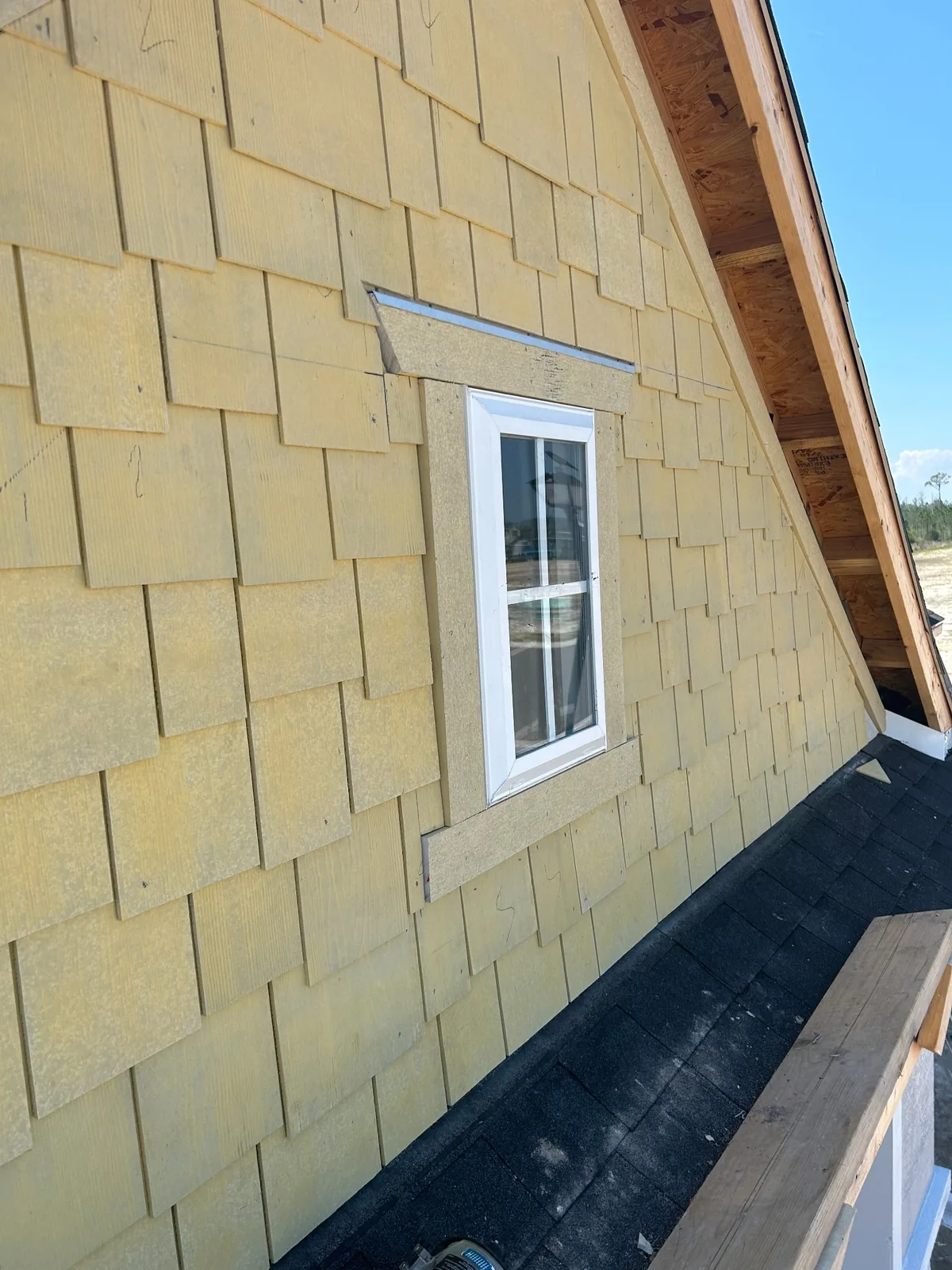 Exterior shingle siding installation by Cypress Building Group